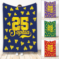 Softball blanket shown upright with yellow softball hearts, bold jersey-style artwork, and multiple background colors