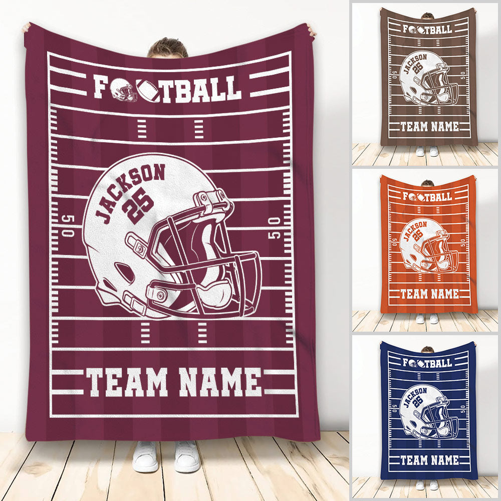 Football throw blanket displayed in maroon, orange, and navy with field markings and helmet artwork
