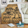 Football throw blanket draped over a sofa with vintage player artwork and brown leather-style graphics