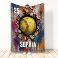 Softball throw blanket featuring a yellow ball breaking through brick with colorful paint splashes