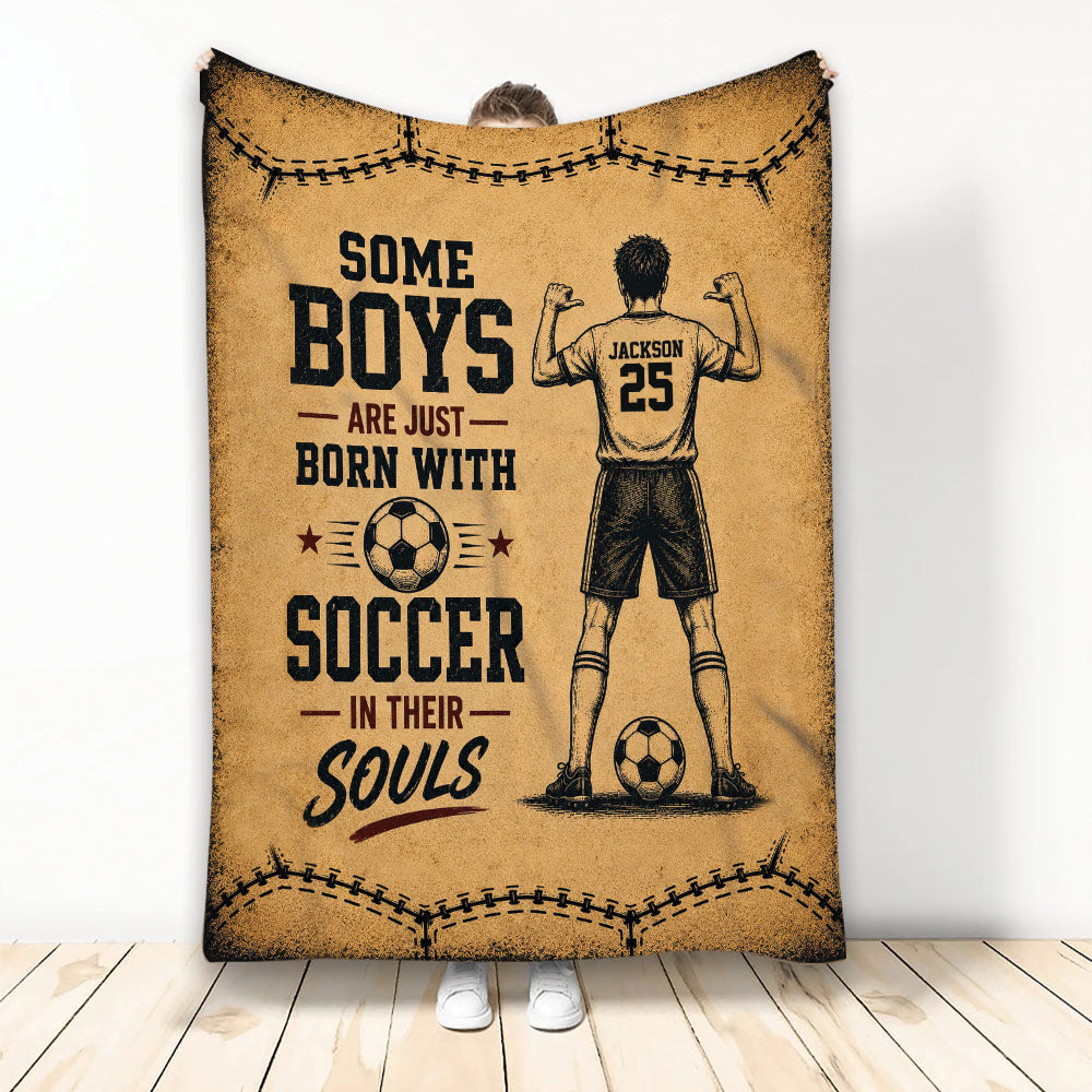 Vintage soccer blanket featuring a player illustration, soccer balls, stitched border, and tan sports artwork