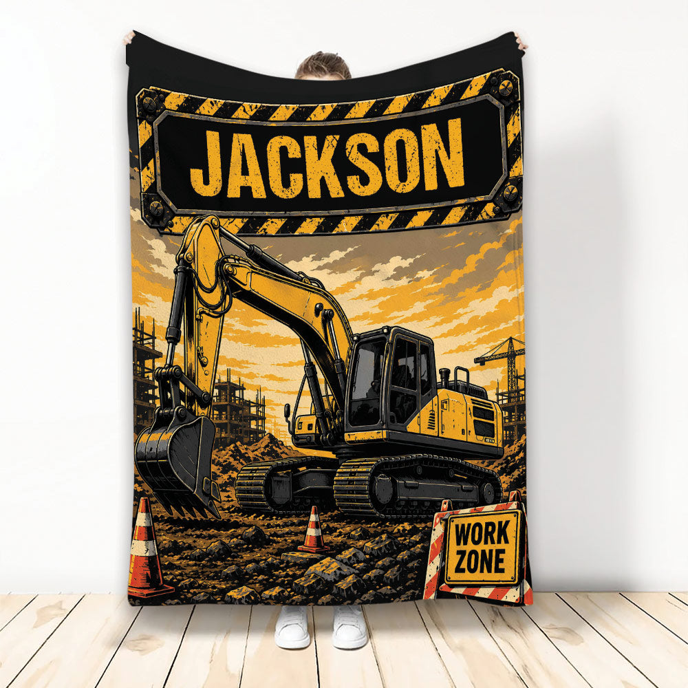 Construction truck blanket featuring a bold yellow excavator, work-zone artwork, traffic cones, and rugged industrial colors