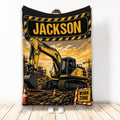 Construction truck blanket featuring a bold yellow excavator, work-zone artwork, traffic cones, and rugged industrial colors