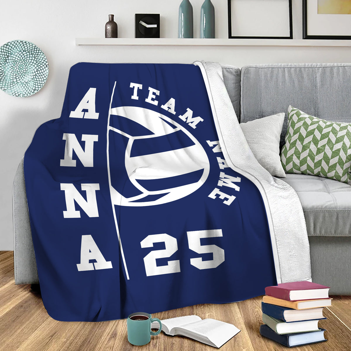 Volleyball throw blanket draped over a sofa for cozy sports-inspired living room decor