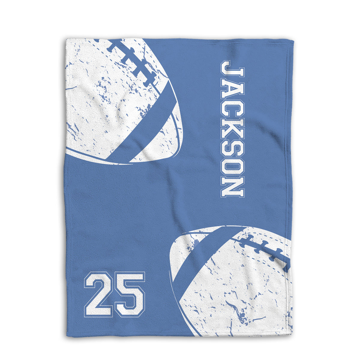 Flat lay of a blue football blanket with distressed white football graphics