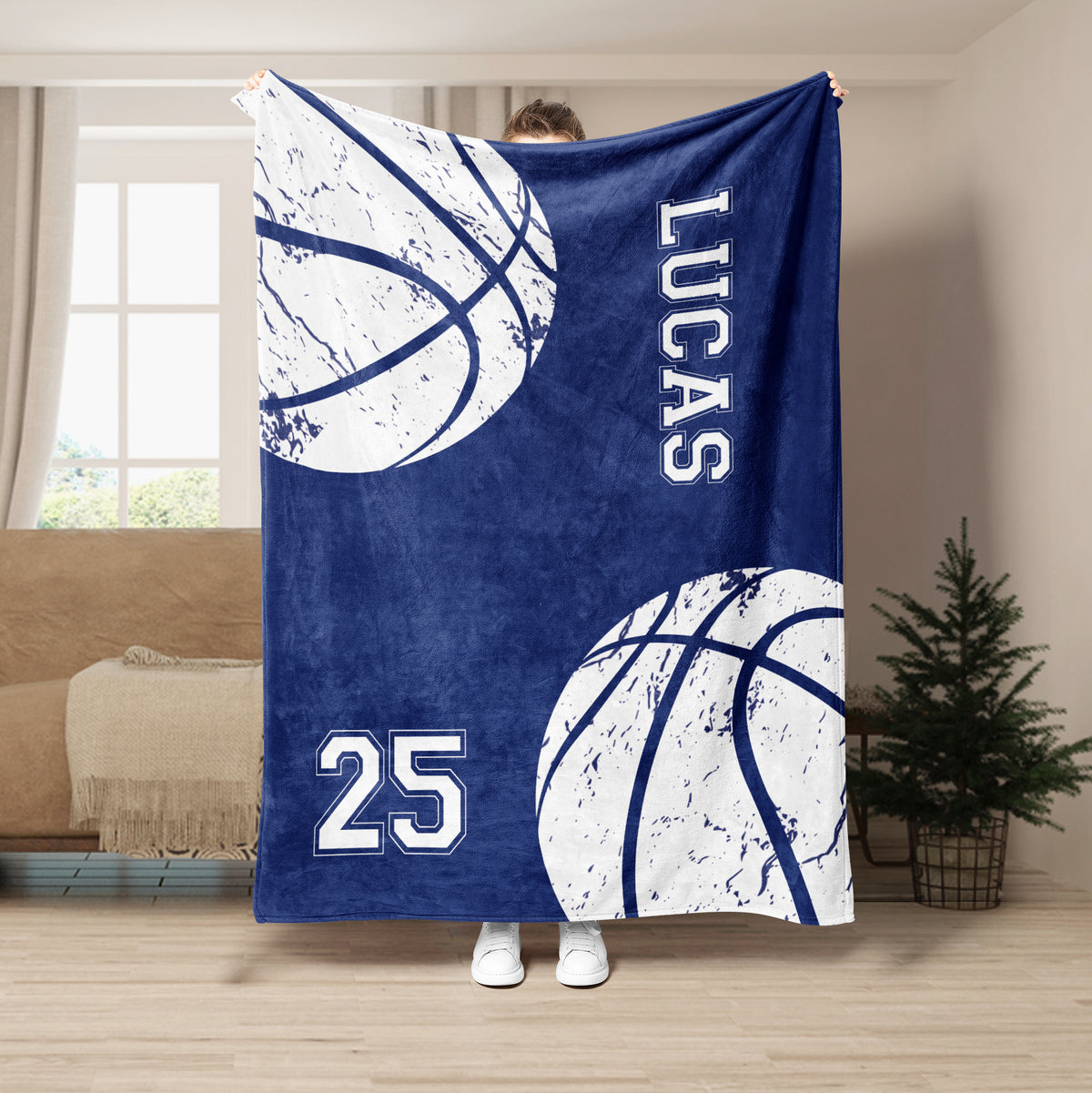 Navy basketball throw blanket shown hanging with distressed white basketball graphics and sporty typography