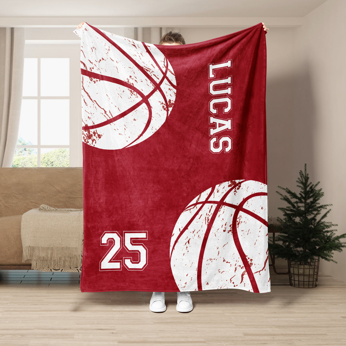 Red basketball throw blanket displayed with large white basketball graphics and sporty jersey-inspired artwork
