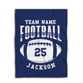 Navy football blanket displayed flat with a bold white football graphic and athletic design