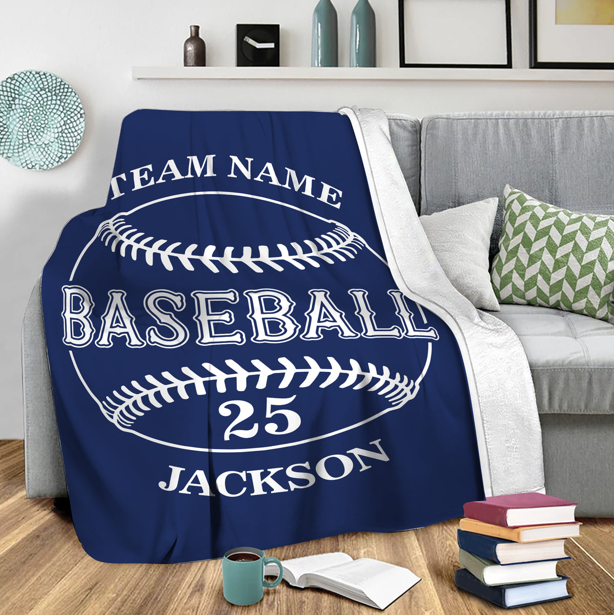 Navy baseball throw blanket draped over a sofa in a cozy living room