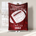 Red football throw blanket featuring coach appreciation artwork and an illustrated football