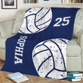 Blue volleyball blanket styled on a sofa with bold volleyball graphics for sports-themed room decor