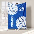 Blue volleyball blanket with large white volleyball graphics and bold collegiate-inspired sports styling