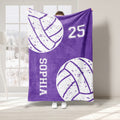 Purple volleyball throw blanket featuring distressed white volleyball graphics and athletic-style design