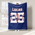 Navy blue baseball throw blanket with bold white jersey-style artwork and stitched baseball details