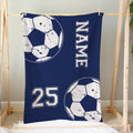 Blue soccer blanket hanging on a wooden frame with large distressed ball graphics and bold sports artwork