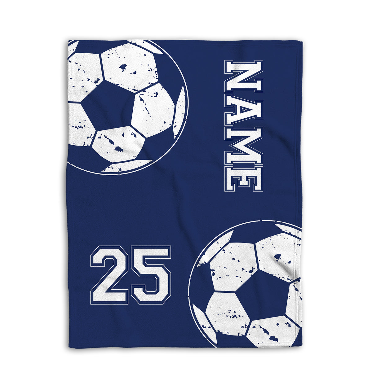 Blue soccer blanket shown flat with large distressed soccer balls and strong navy and white sports artwork