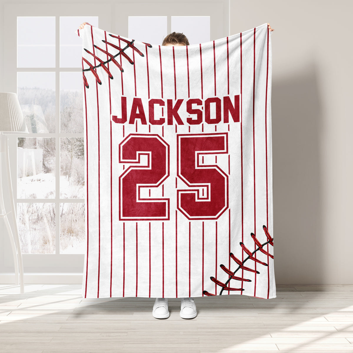 Red baseball throw blanket with pinstripes, stitched baseball details, and bold jersey-style sports artwork