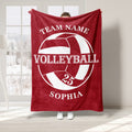 Red volleyball blanket featuring a large white volleyball graphic and team-style sports design