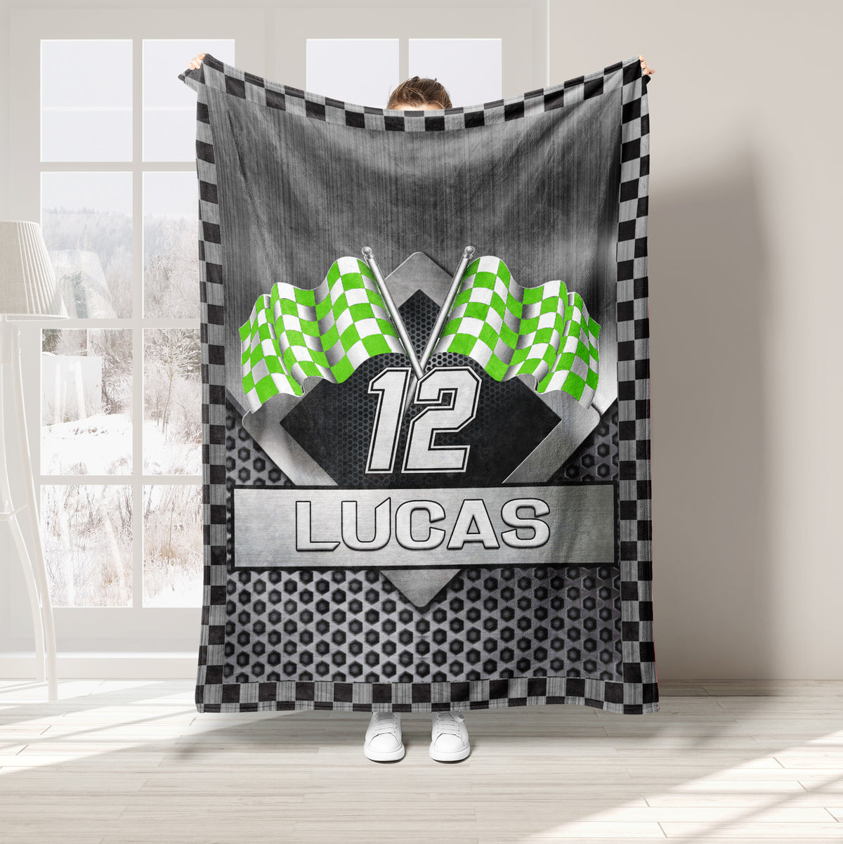 Green checkered flag racing blanket displayed in a bright room with bold motorsport artwork