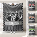 Custom racing throw blanket with checkered flags, racing number artwork, and black and white border