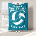 Teal volleyball throw blanket displayed with large white volleyball graphic and athletic design