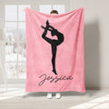 Soft pink gymnastics blanket featuring a black silhouette balancing in an artistic pose