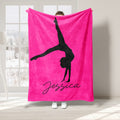 Bright pink gymnastics blanket featuring a black silhouette performing an extended pose