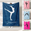 Gymnastics blanket display with athletic silhouettes in blue and pink color variations