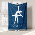 Navy blue ballet throw blanket featuring a white ballerina silhouette in a dance pose