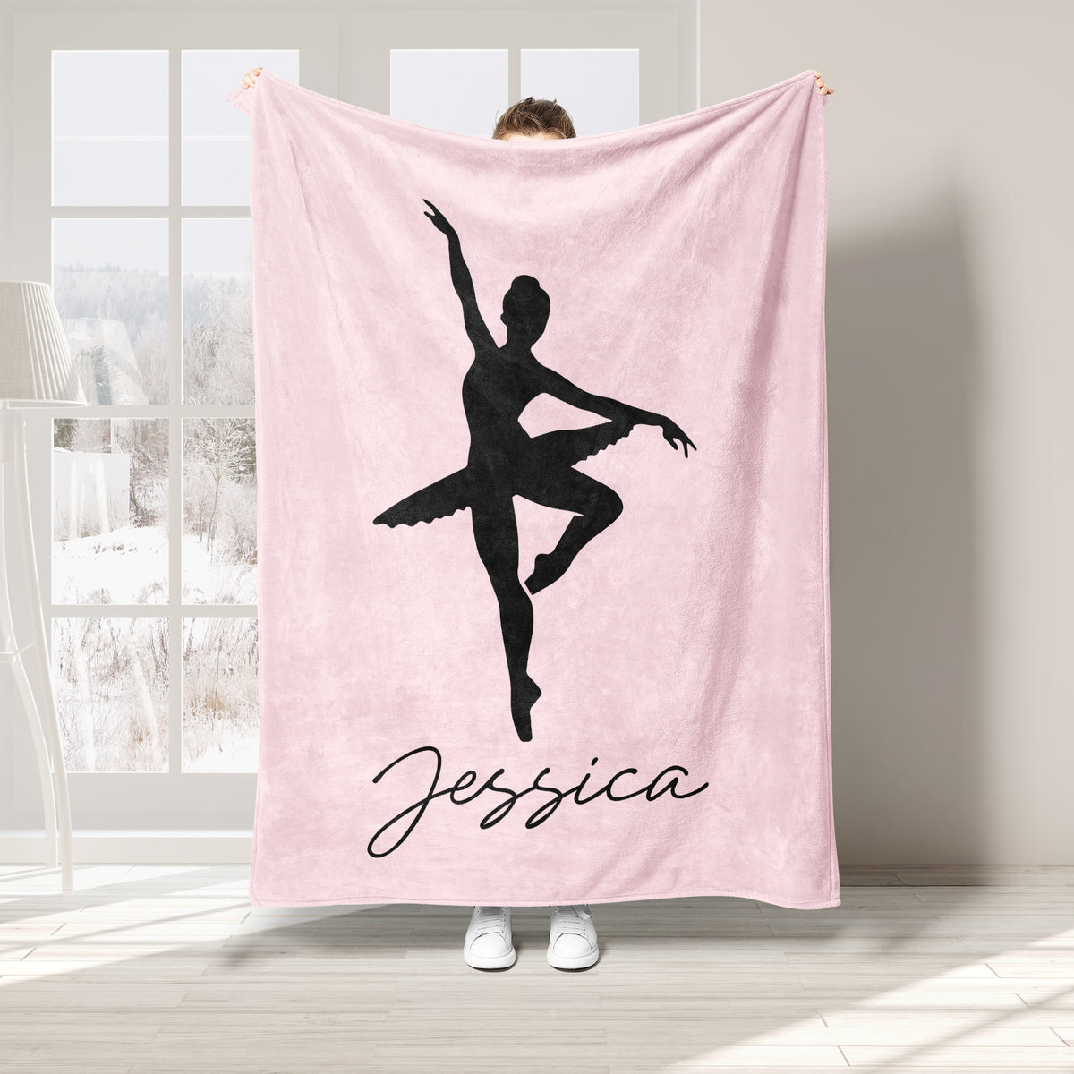 Pink ballet throw blanket featuring a black ballerina silhouette in a graceful pose