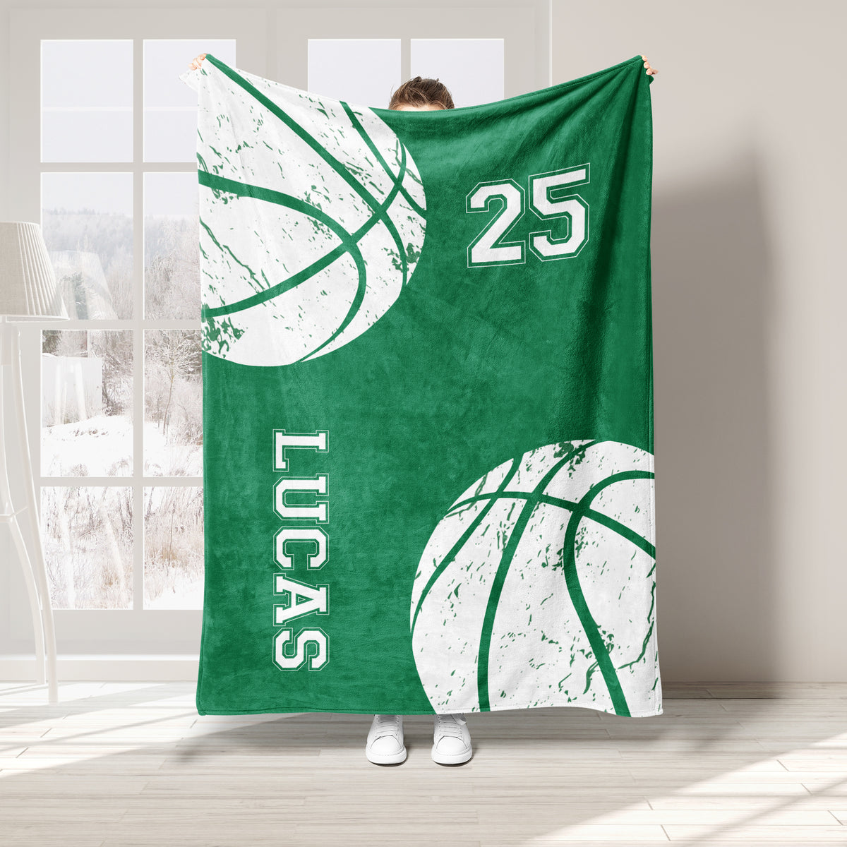 Green basketball throw blanket with white basketball artwork and bold varsity-inspired graphics