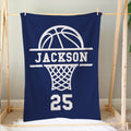 Navy basketball blanket hanging on a wooden frame with a large white basketball hoop graphic