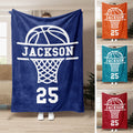 Basketball throw blanket with bold hoop graphic shown in navy, orange, teal, and red color options