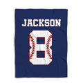 Navy baseball blanket displayed flat with a large white baseball-inspired graphic and red stitching details