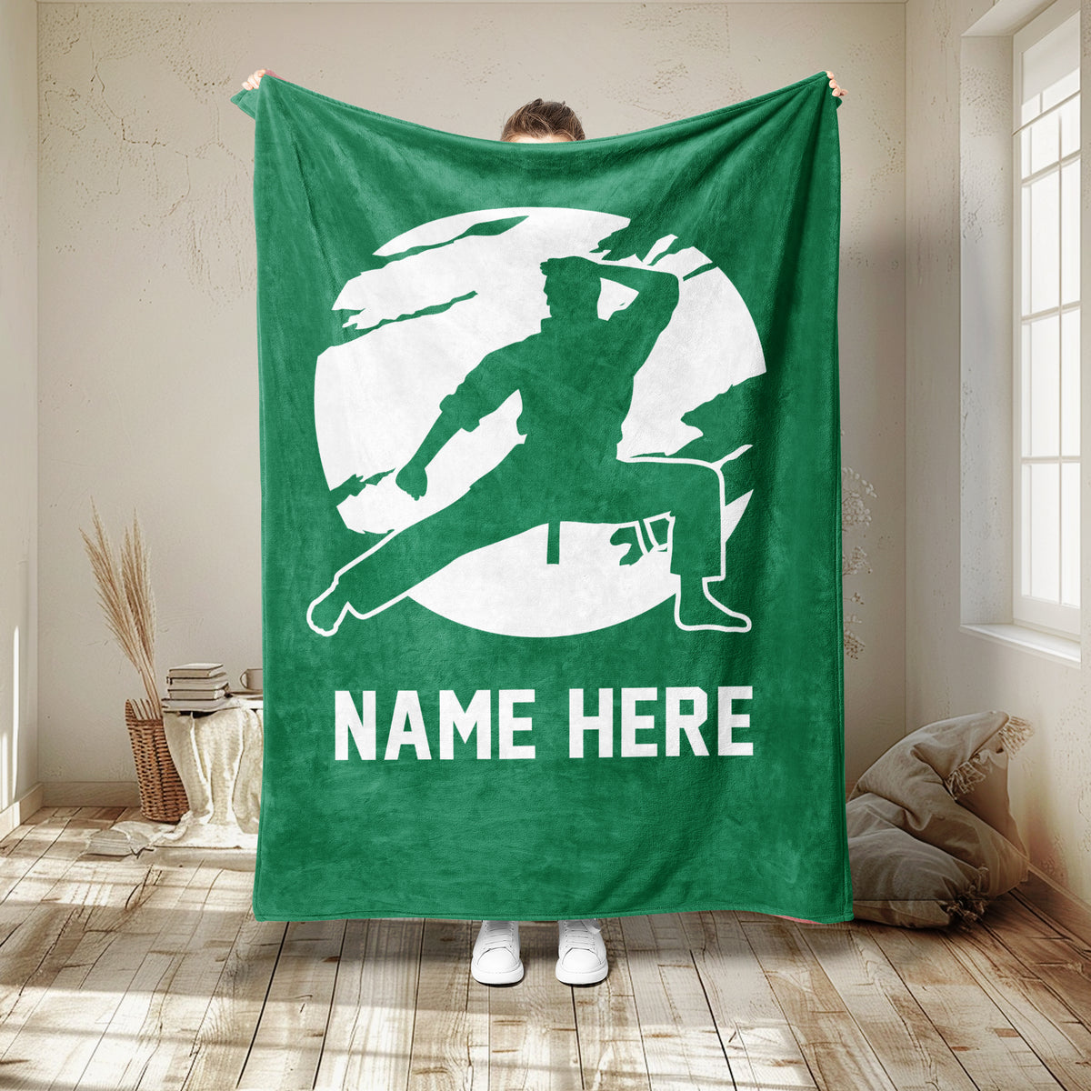 Green karate blanket with a dynamic martial artist silhouette performing a high kick