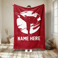 Red karate throw blanket displaying a martial artist silhouette in a powerful kicking pose