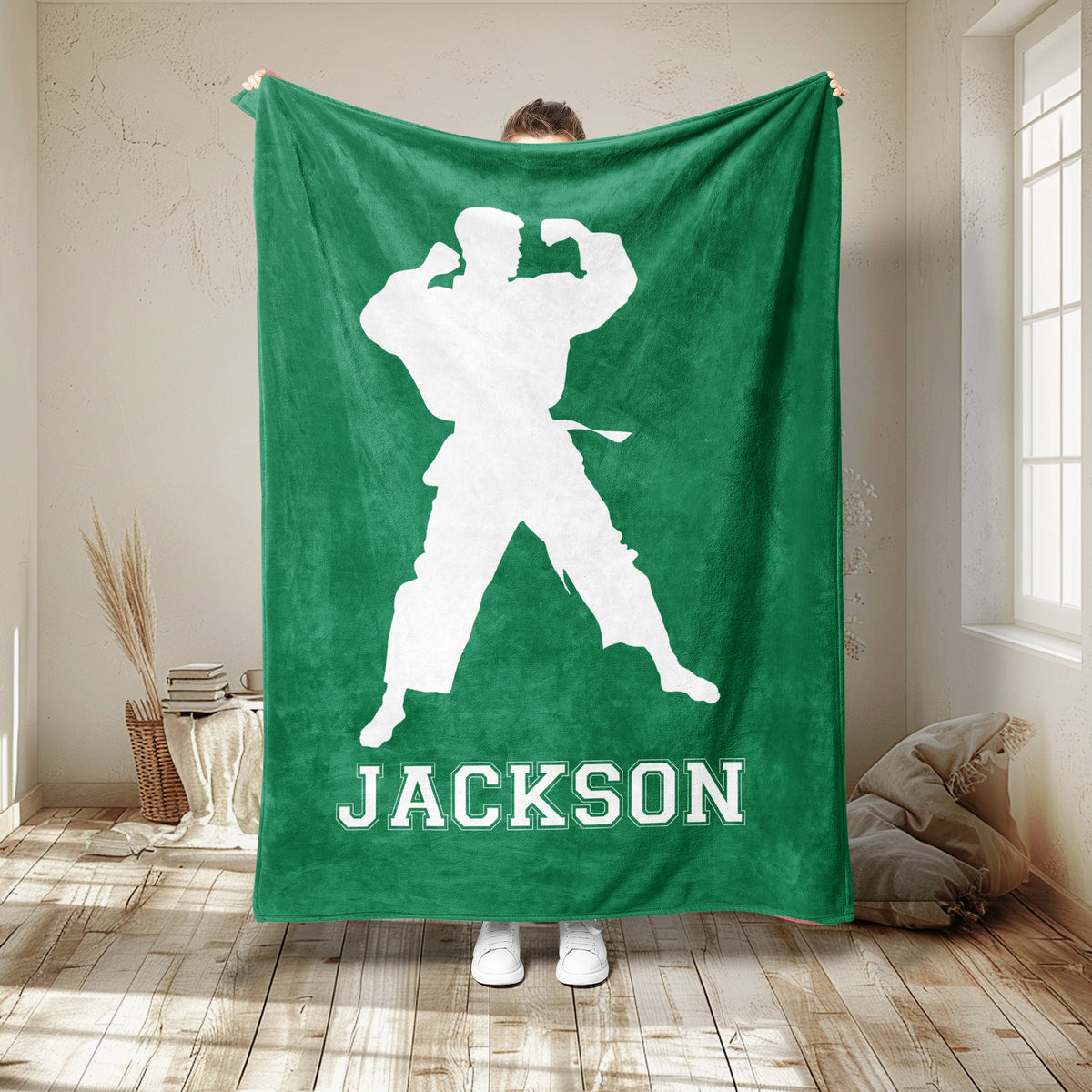 Green Taekwondo blanket featuring a white martial artist silhouette in a strong fighting stance