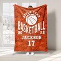 Orange camouflage basketball throw blanket with a prominent white basketball graphic and sporty theme