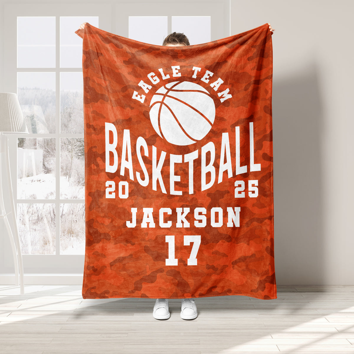 Orange camouflage basketball throw blanket with a prominent white basketball graphic and sporty theme