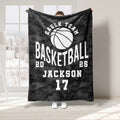 Black camouflage basketball throw blanket with a large white basketball graphic and athletic design