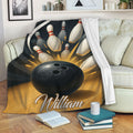 Bowling blanket displayed on a sofa with a bowling ball and pins bursting across the design