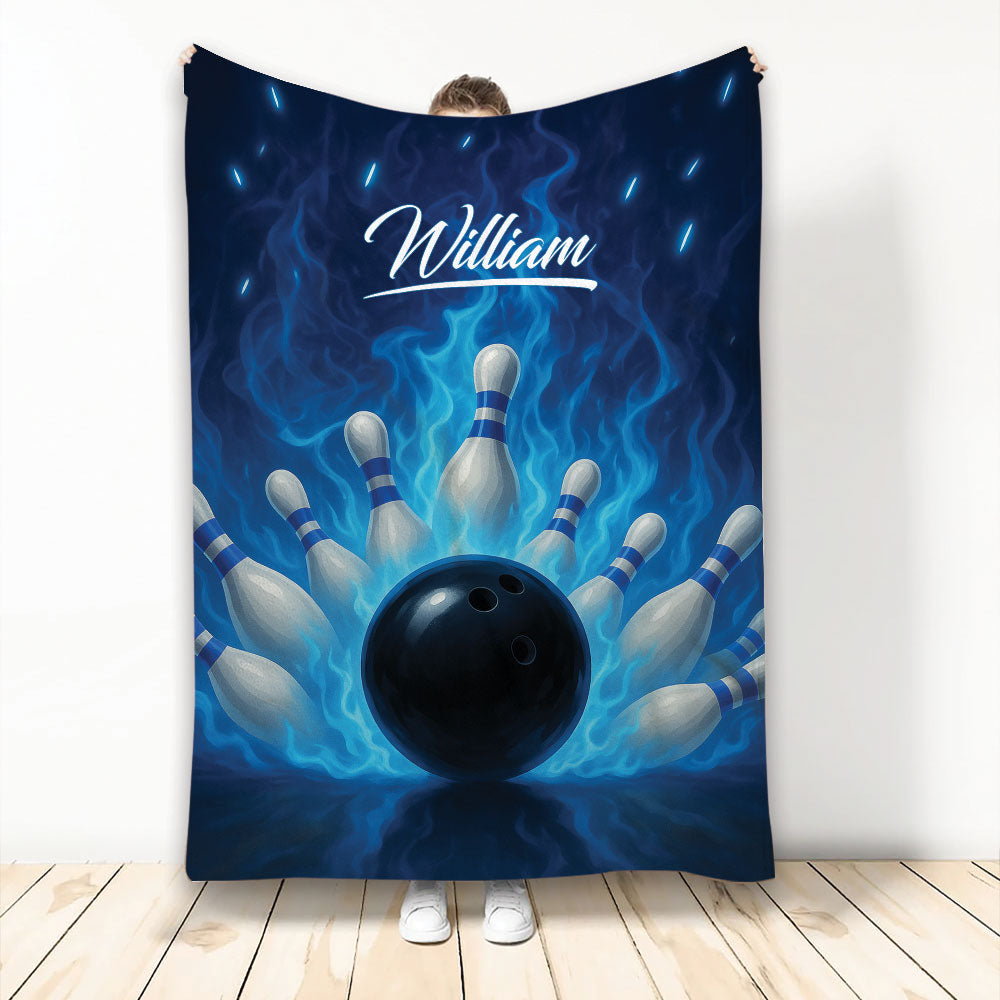 Bowling throw blanket displayed upright with a black bowling ball, pins, and vivid blue flame artwork