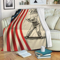 Golf blanket draped over a sofa, showing a golfer sketch and patriotic red, white, and blue design