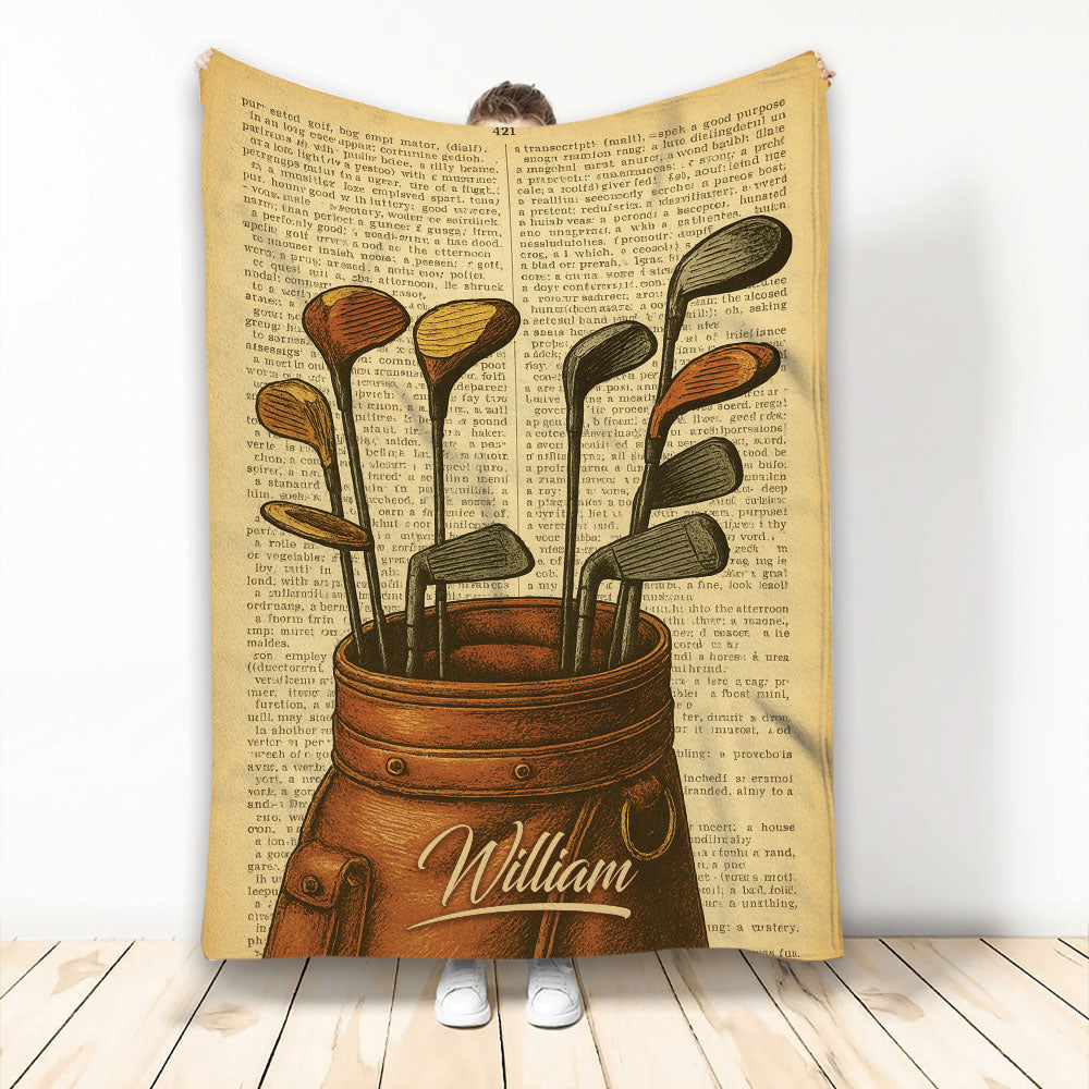 Golf throw blanket featuring vintage illustrated clubs in a leather golf bag with warm sepia book-page artwork