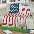 Golf throw blanket with red golf clubs, a dimpled ball on a tee, grass, and patriotic colors