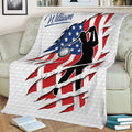 Golf throw blanket displayed on a couch with bold red, white, and blue golfer artwork