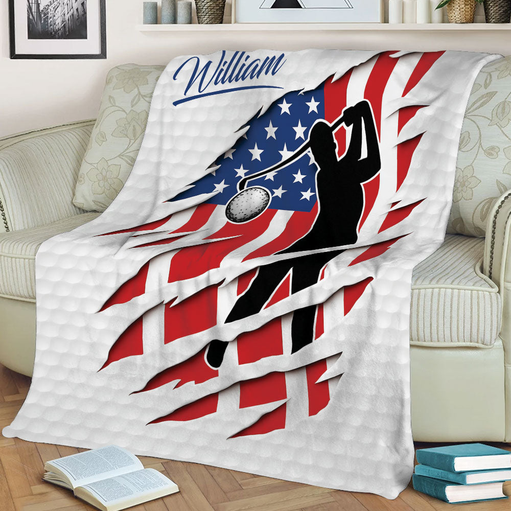 Golf throw blanket displayed on a couch with bold red, white, and blue golfer artwork
