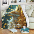 Custom fox blanket displayed on a sofa with vivid teal, gold, and nature-inspired artwork
