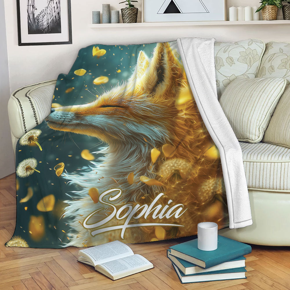 Custom fox blanket displayed on a sofa with vivid teal, gold, and nature-inspired artwork