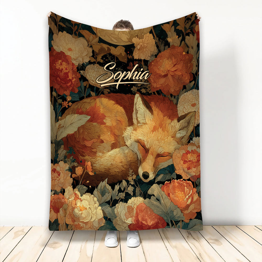 Fox throw blanket with sleeping fox artwork surrounded by autumnal flowers and leafy botanical details